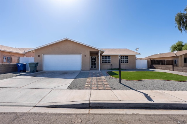 1986 S 47th Ave, Yuma, AZ 85364 - ranch-style home featuring a garage, stucco siding, and driveway