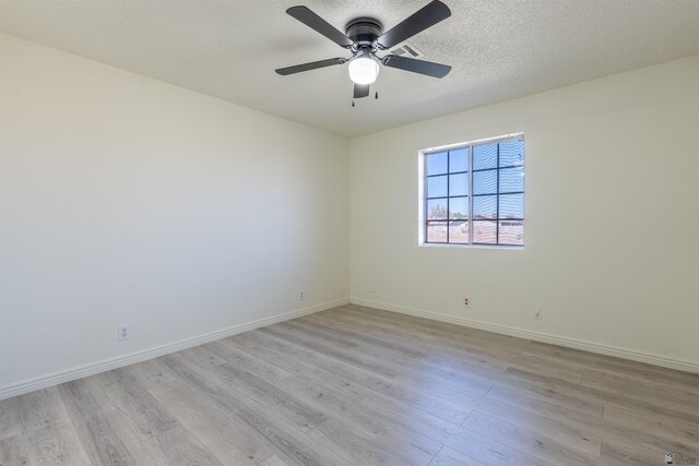 1986 S 47th Ave, Yuma, AZ 85364 - empty room with light wood-style floors, baseboards, ceiling fan, and a textured ceiling