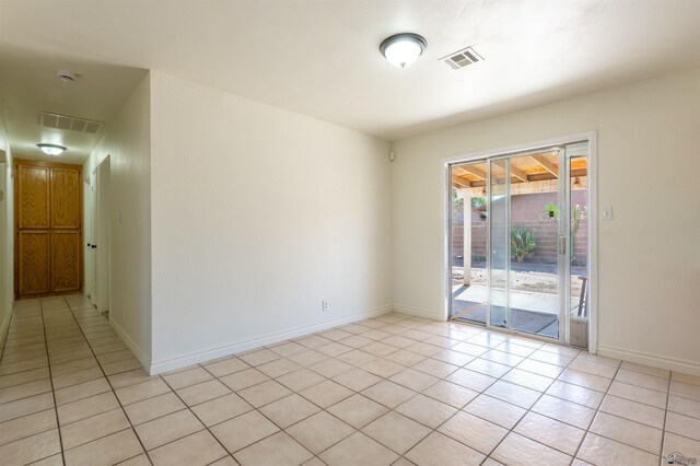 1986 S 47th Ave, Yuma, AZ 85364 - spare room with light tile patterned floors and baseboards