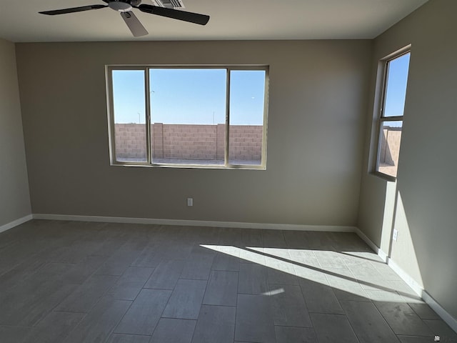 spare room featuring ceiling fan