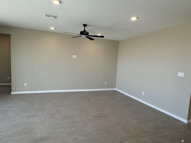 unfurnished room featuring ceiling fan