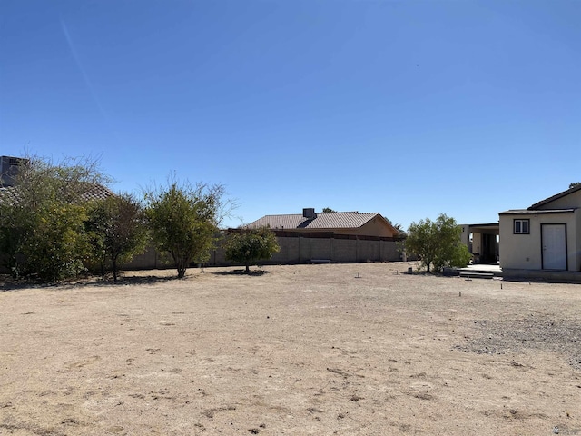 view of yard featuring fence