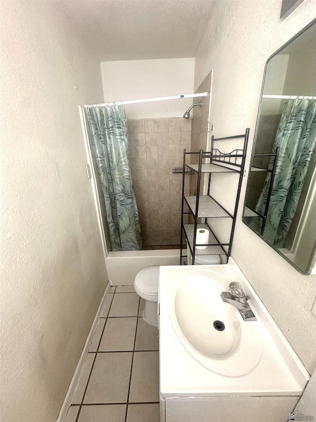 10201/2 S 9th Ave, Yuma, AZ 85364 - bathroom with tile patterned flooring, shower / bath combination with curtain, a textured wall, toilet, and vanity