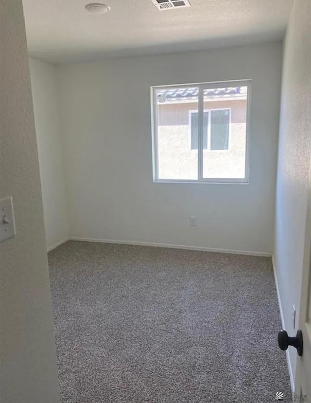 7903 E 46th Ln, Yuma, AZ 85365 - unfurnished room with carpet flooring and baseboards