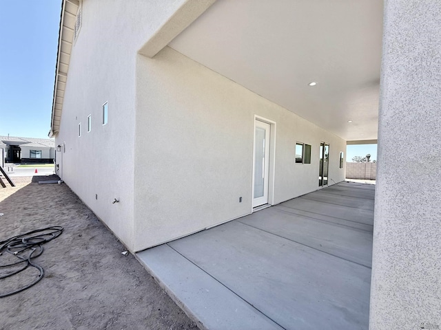 12360 E Calle Ln, Primera, Yuma, AZ 85367 - view of exterior entry with a patio and stucco siding