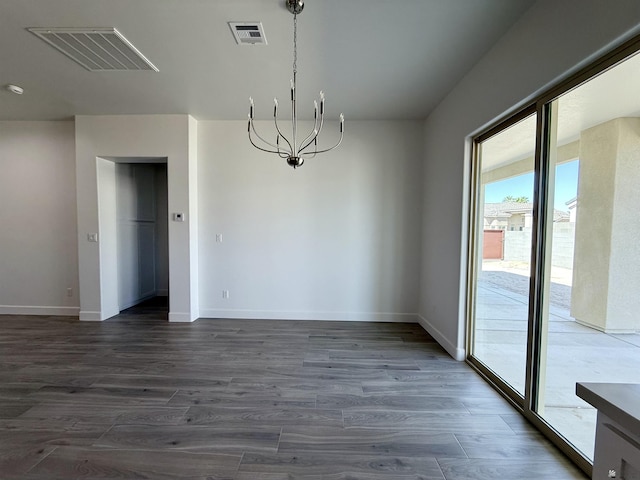 12360 E Calle Ln, Primera, Yuma, AZ 85367 - unfurnished dining area featuring dark wood-style flooring, baseboards, and visible vents