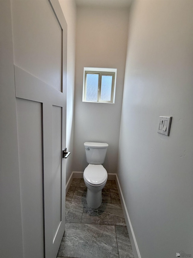 12360 E Calle Ln, Primera, Yuma, AZ 85367 - bathroom featuring baseboards and toilet