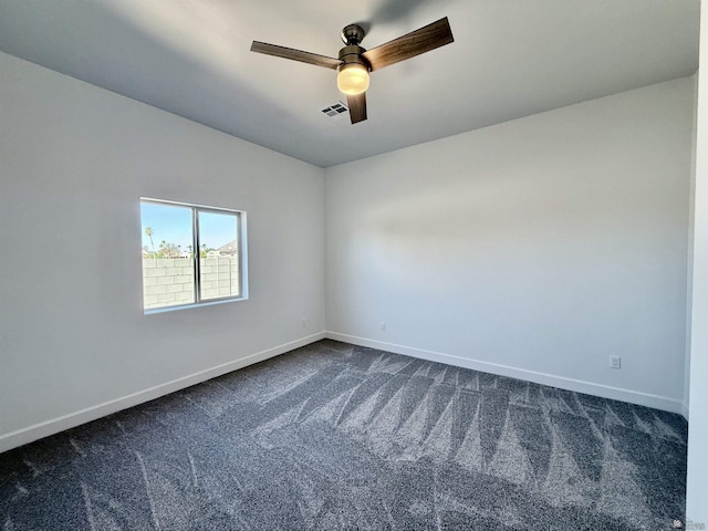 12360 E Calle Ln, Primera, Yuma, AZ 85367 - spare room featuring baseboards, ceiling fan, dark carpet, and visible vents