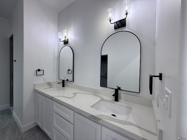 12360 E Calle Ln, Primera, Yuma, AZ 85367 - full bath featuring double vanity, baseboards, and a sink