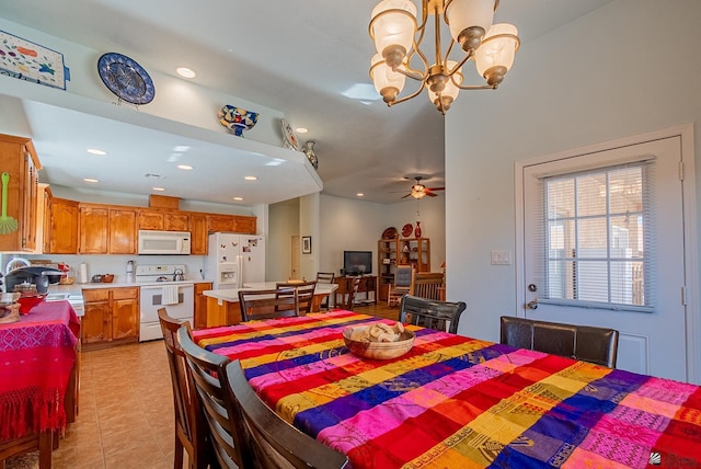 14326 E 51st St, Yuma, AZ 85367 - bedroom featuring light tile patterned flooring, recessed lighting, a chandelier, and white fridge with ice dispenser