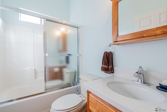 14326 E 51st St, Yuma, AZ 85367 - full bathroom featuring toilet, enclosed tub / shower combo, and vanity