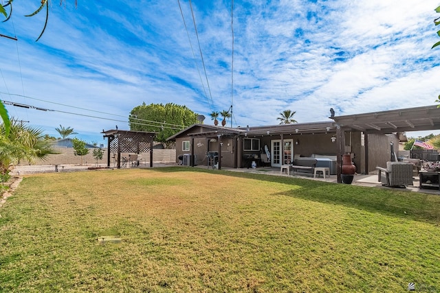 view of yard with fence, a pergola, outdoor lounge area, cooling unit, and a patio area