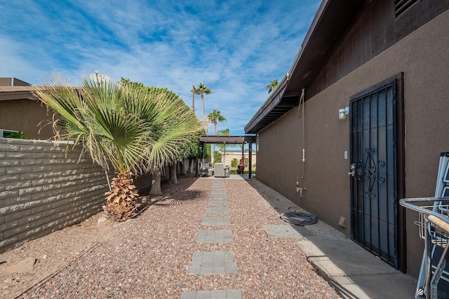 view of yard featuring fence