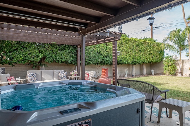 view of patio / terrace with a fenced backyard, a pergola, and a hot tub