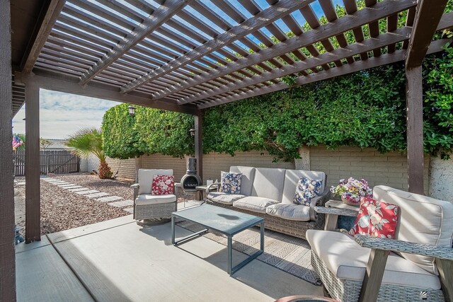 view of patio featuring a fenced backyard, outdoor lounge area, and a pergola