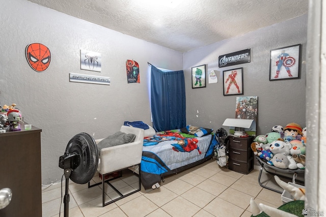 1127 S 13th Ave, Yuma, AZ 85364 - tiled bedroom featuring a textured ceiling and a textured wall