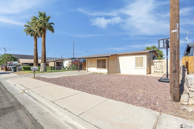 1127 S 13th Ave, Yuma, AZ 85364 - ranch-style home with stucco siding and concrete driveway