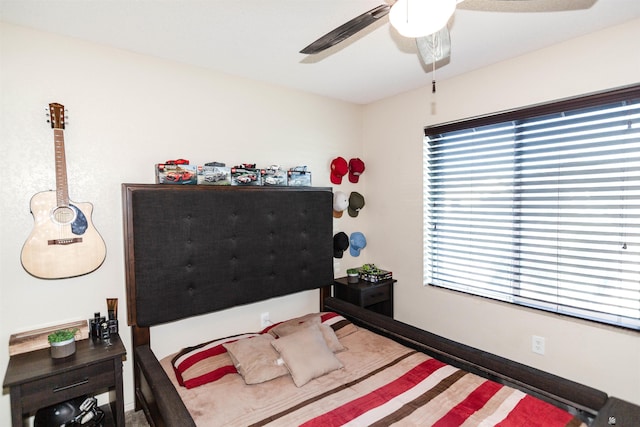bedroom featuring ceiling fan