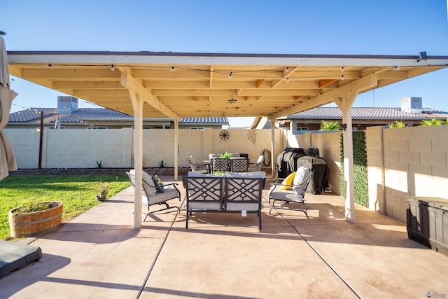 view of patio with a fenced backyard and outdoor lounge area