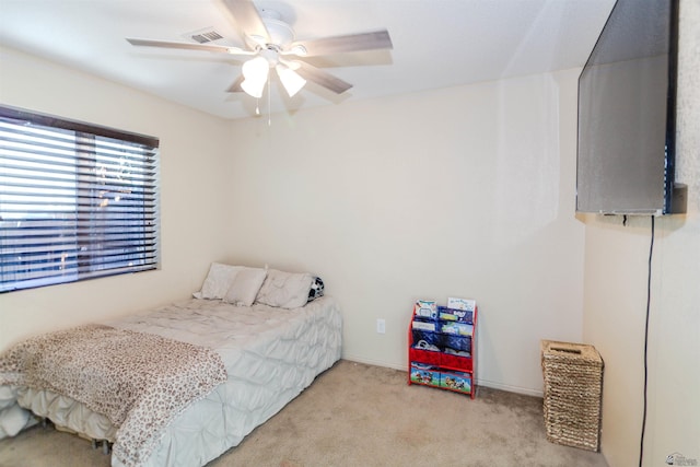 carpeted bedroom featuring ceiling fan