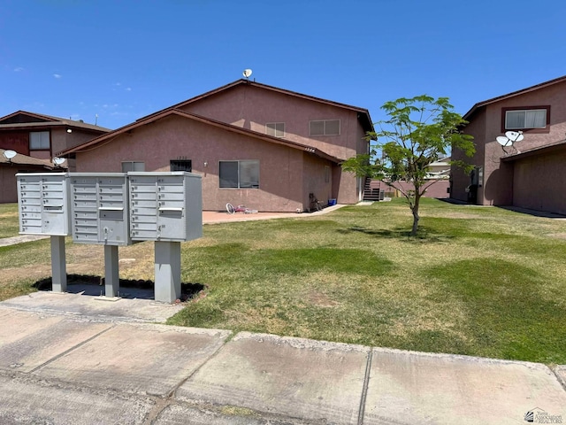 1234 W 20th Pl, Yuma, AZ 85364 - surrounding community with mail area and a yard