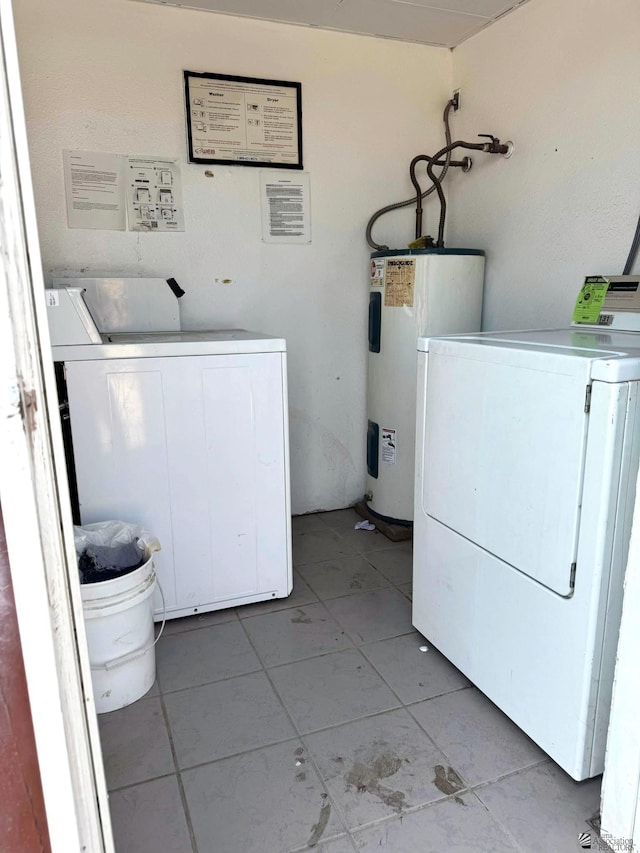 1234 W 20th Pl, Yuma, AZ 85364 - laundry room with water heater, washing machine and dryer, and light tile patterned floors