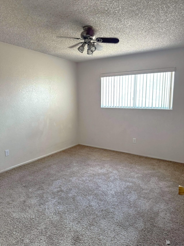 1234 W 20th Pl, Yuma, AZ 85364 - unfurnished room with ceiling fan, carpet flooring, a textured ceiling, and baseboards