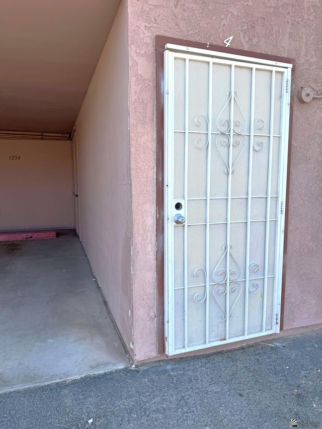 1234 W 20th Pl, Yuma, AZ 85364 - doorway to property with stucco siding