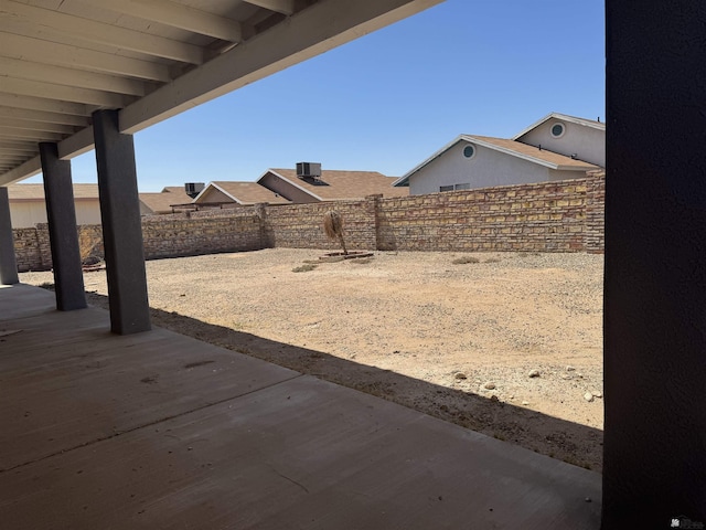 10310 E 37th Pl, Yuma, AZ 85365 - fenced backyard with a patio