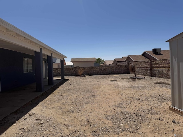 10310 E 37th Pl, Yuma, AZ 85365 - fenced backyard with a patio