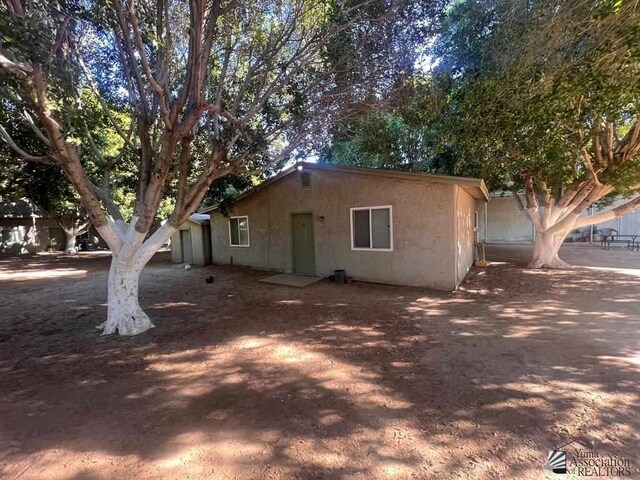 224 Somerton Avenue 224 & 230N. Somerton Ave, Somerton, AZ 85350 - exterior space featuring stucco siding