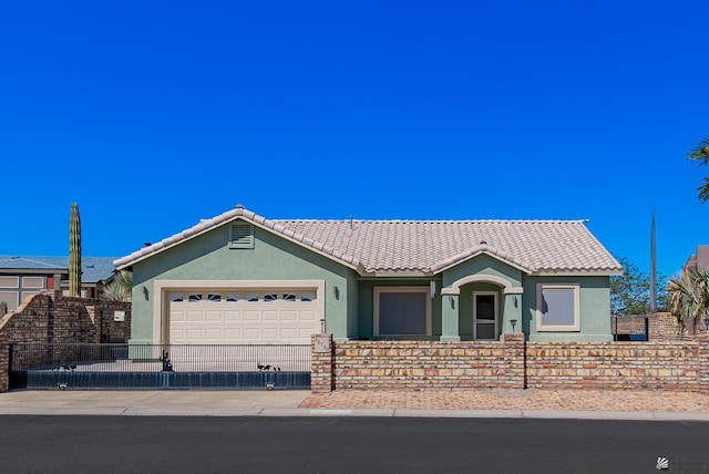 13736 S Chase Way, Yuma, AZ 85367 - ranch-style home with a garage, a tiled roof, stucco siding, fence, and driveway