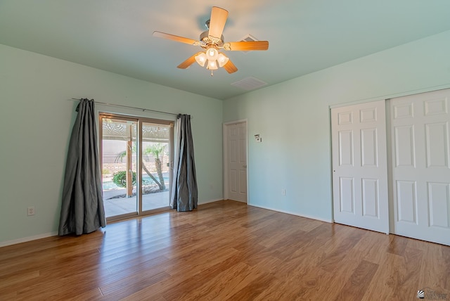 13736 S Chase Way, Yuma, AZ 85367 - unfurnished bedroom featuring a ceiling fan, visible vents, baseboards, light wood-style floors, and access to outside