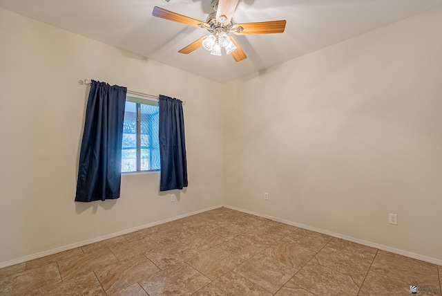 13736 S Chase Way, Yuma, AZ 85367 - spare room with stone finish floor, baseboards, and ceiling fan