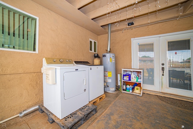 2556 W 14th St, Yuma, AZ 85364 - washroom featuring water heater, washing machine and dryer, and a textured wall