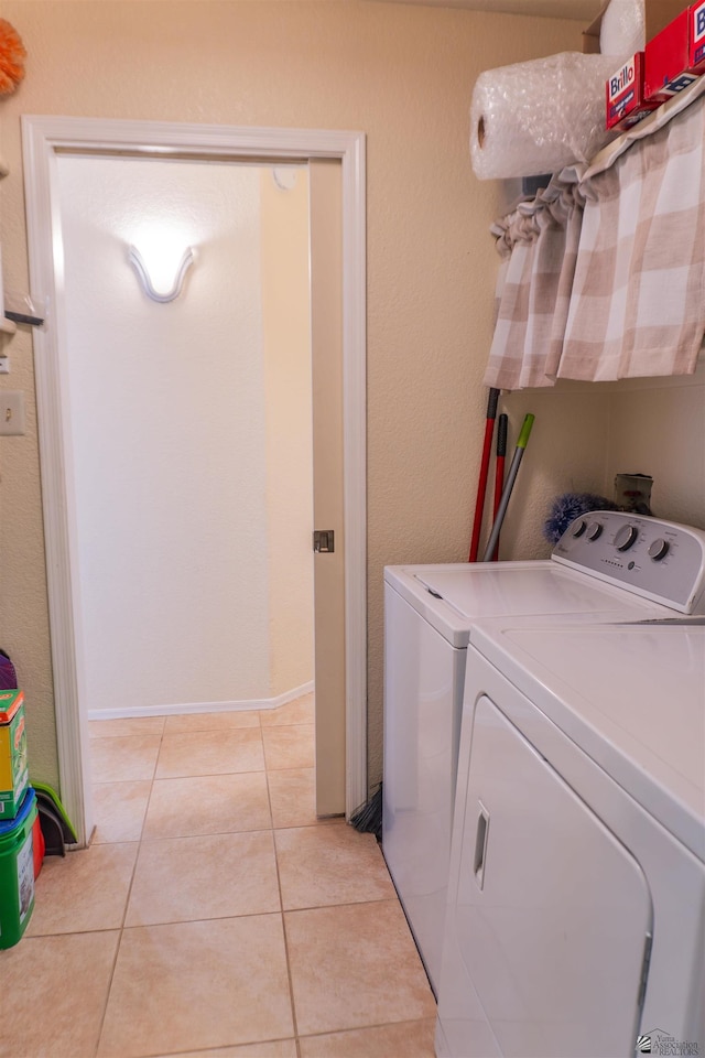 10453 S Del Rico, Yuma, AZ 85367 - clothes washing area featuring light tile patterned floors, laundry area, and washer and clothes dryer