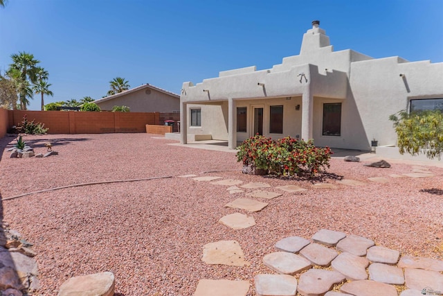 10453 S Del Rico, Yuma, AZ 85367 - back of property with a fenced backyard, a patio area, and stucco siding
