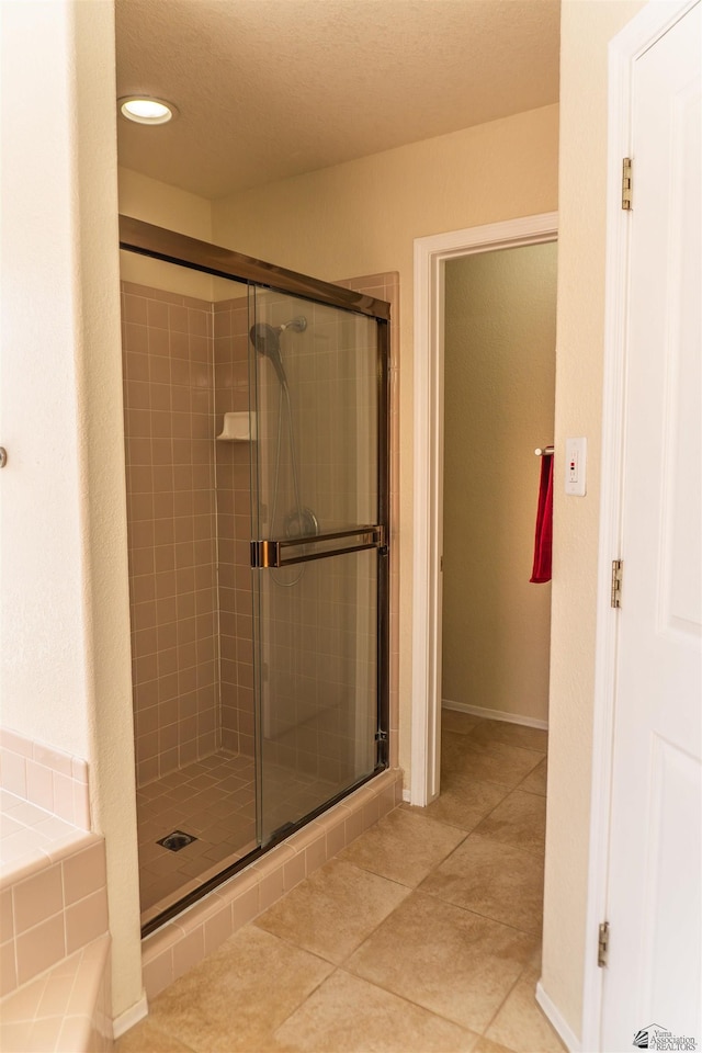 10453 S Del Rico, Yuma, AZ 85367 - bathroom with recessed lighting, tile patterned floors, and a stall shower