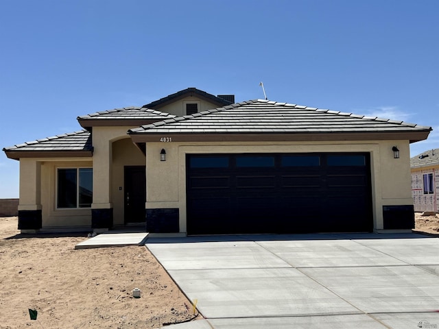 view of front of home featuring a garage