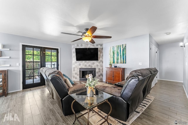 2032 W 13th Ln, Yuma, AZ 85364 - living area with wood finished floors, a ceiling fan, baseboards, and french doors