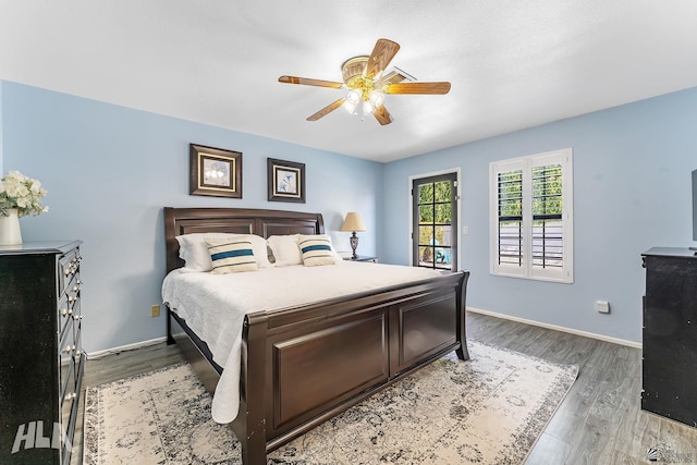 2032 W 13th Ln, Yuma, AZ 85364 - bedroom featuring light wood-type flooring, baseboards, and ceiling fan