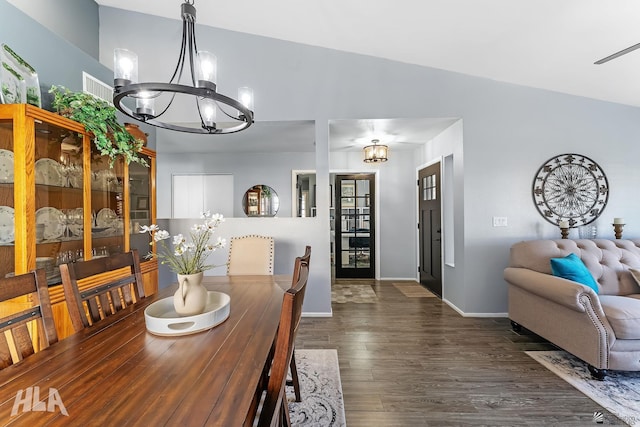 2032 W 13th Ln, Yuma, AZ 85364 - dining space with a chandelier, wood finished floors, and baseboards