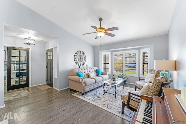 2032 W 13th Ln, Yuma, AZ 85364 - living area featuring wood finished floors, baseboards, and lofted ceiling