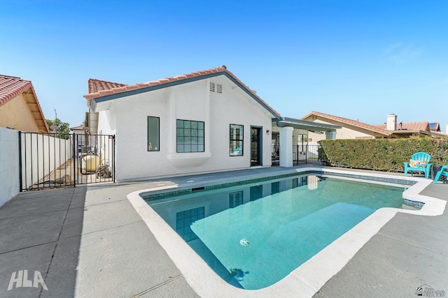 2032 W 13th Ln, Yuma, AZ 85364 - view of swimming pool featuring a gate, fence, and a patio