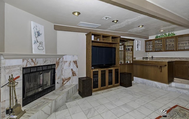 1376 S Hettema St, Yuma, AZ 85364 - living room with a fireplace and light marble finish flooring