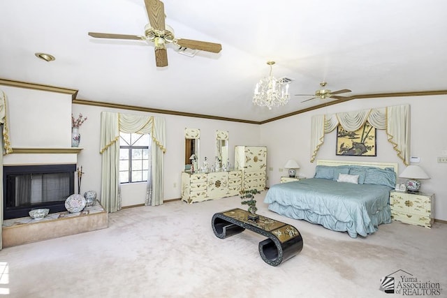 1376 S Hettema St, Yuma, AZ 85364 - carpeted bedroom featuring ornamental molding, vaulted ceiling, a chandelier, a fireplace with raised hearth, and ceiling fan