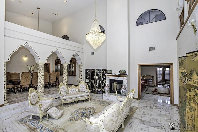 1376 S Hettema St, Yuma, AZ 85364 - living area with marble tiled flooring, a high ceiling, a chandelier, recessed lighting, and baseboards