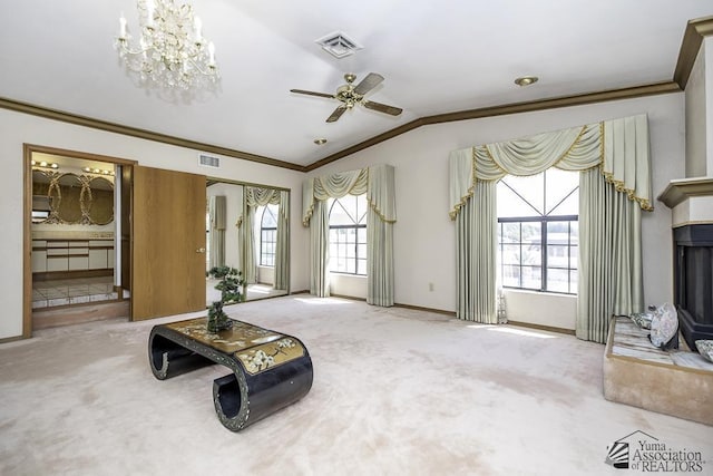 1376 S Hettema St, Yuma, AZ 85364 - unfurnished living room featuring vaulted ceiling, crown molding, plenty of natural light, a ceiling fan, and carpet floors