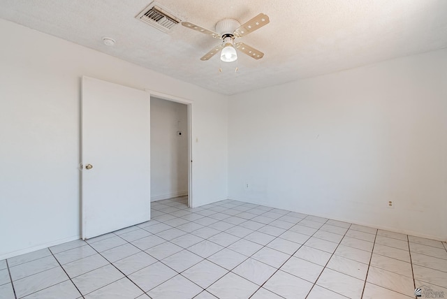 2320 S Maple Ave, Yuma, AZ 85364 - spare room with ceiling fan, a textured ceiling, and a smoke detector