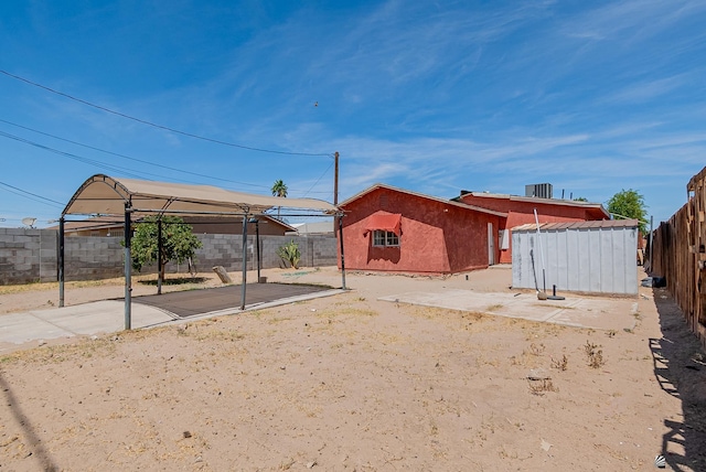 2320 S Maple Ave, Yuma, AZ 85364 - fenced backyard with a patio area